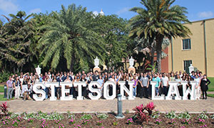 an incoming admissions class posing together