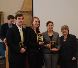 L-R): Professor Royal Gardner in background, University of Maryland Law students William Tilburg, April Morton, Best Oralist Molly Knoll, and Stetson Law Dean Darby Dickerson.