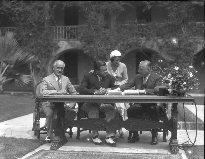 Babe Ruth signing historic Yankees contract.