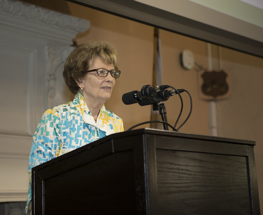 Stetson Board of Trustees Chair Maureen Breakiron-Evans speaks at a podium in Stetson Law's Great Hall.