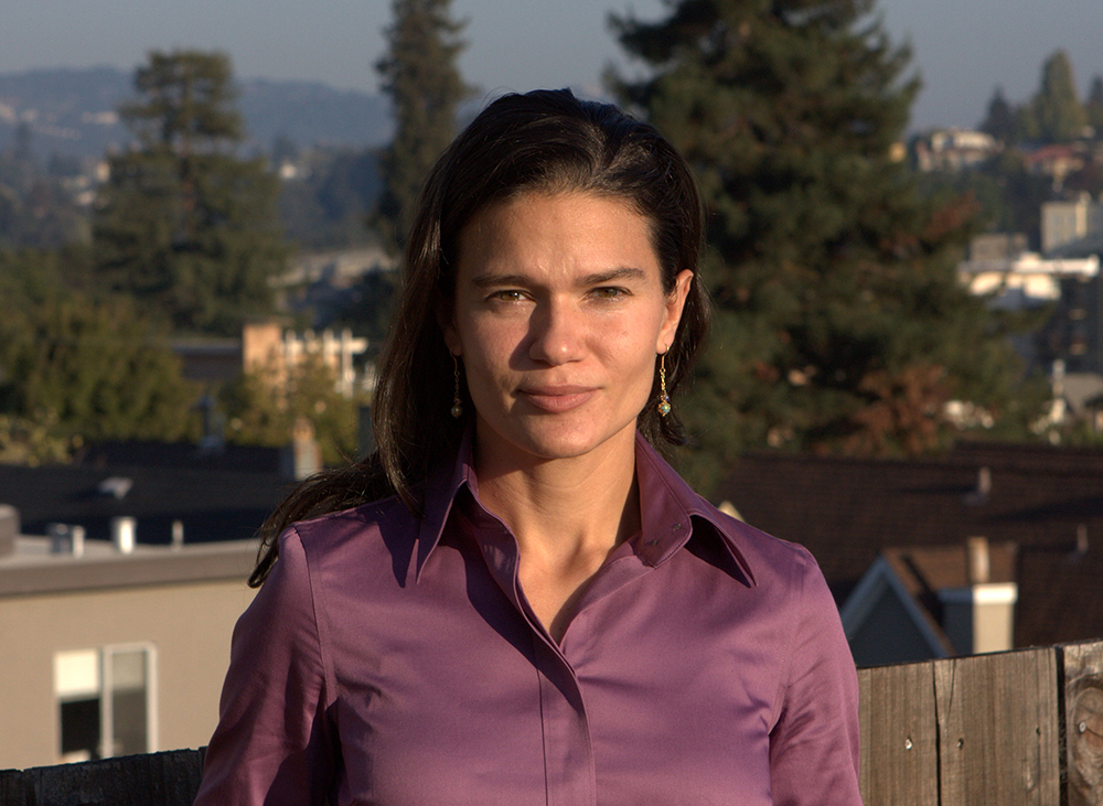 A headshot of Stetson Law Professor Jaclyn Lopez in front of a hilly outdoor backdrop.
