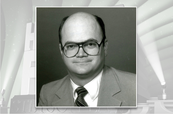 A black-and-white headshot of Professor Emeritus John Cooper