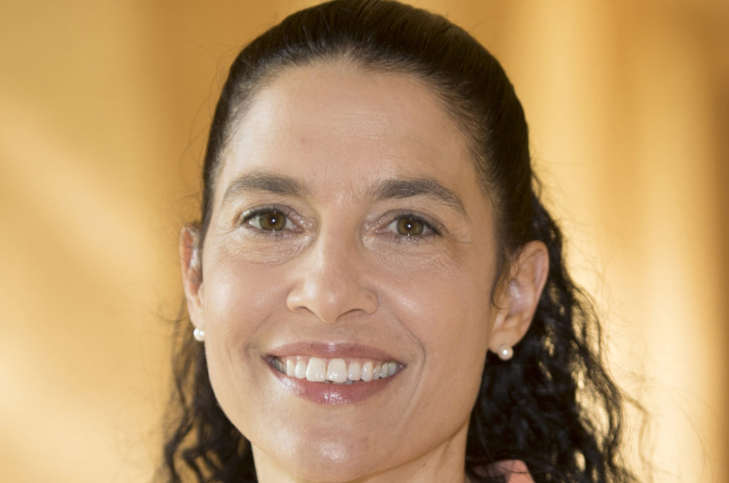 A headshot of Law Professor Theresa Pulley Radwan