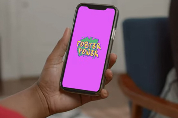 A screenshot from a YouTube video featuring a smartphone that reads "Foster Power" on the screen.