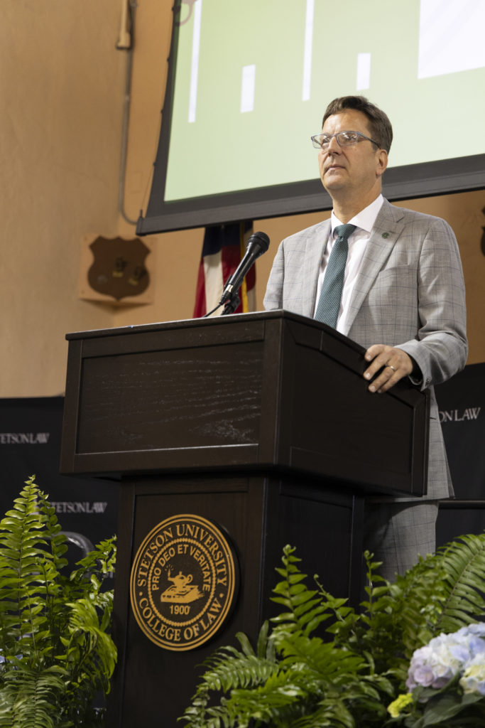 Stetson University President Christopher Roellke addresses the audience at the 2025 Graduate Awards Ceremony.