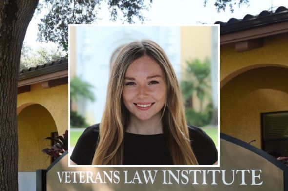A headshot of a young woman smiling against a backdrop of the building that houses the Veterans Law Institute