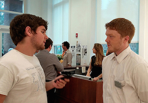 David Baker, left, interviews Mitch Robey. 