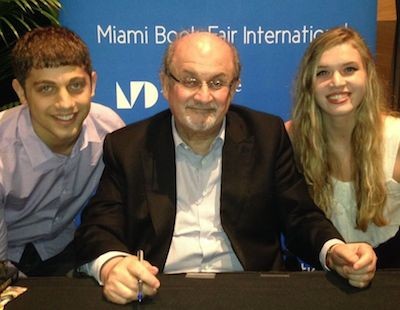 George Salis '15, left, and Nicole Melchionda attended public lecture with Salman Rushdie in Miami.