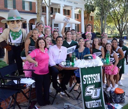 Fox-35 News anchors pose with Hatter cheerleaders and John B, October 2013.