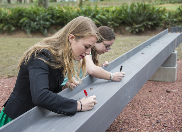 Students, faculty and staff are invited to sign the beam which will be the highest beam on the new Rinker Welcome Center.