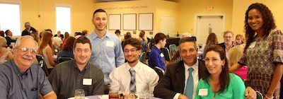 Scholarship donor Terry Williams with son Ross, and scholarship recipients David Shoemake and David Ramirez, and scholarship donors Ron and Dominique Piccolo with their recipient Savanna Wharton-Lake.