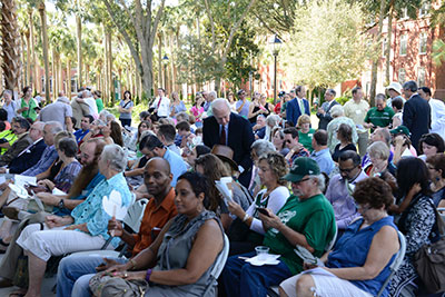 People gather for the grand opening of the Rinker Welcome Center on Saturday.