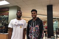 Kevin Ndahiro of Toronto, Canada, left, and Larry Dennis of Wichita, Kansas, needed a safe place to stay during Hurricane Matthew and were invited home with fellow teammates on the Hatters basketball team. 