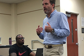 Stetson Visiting Lecturer Lou Paris talks to students in his class in the Stetson School of Business Administration.