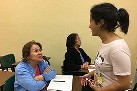 Stetson student Valeria Servigna tutors Julieta Almeida of Venezuela.