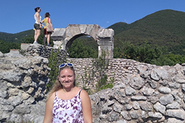 Stetson student Kayla MacPhee stands in front of Roman ruins in Italy.