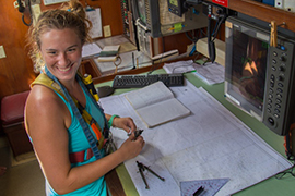 Kathryn Benson works at a nautical chart