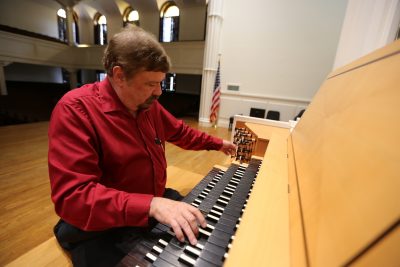 Boyd Jones plays the keyboards of the Beckerath Organ in Lee Chapel