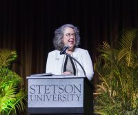 Stetson President Wendy Libby on stage at the lecturn