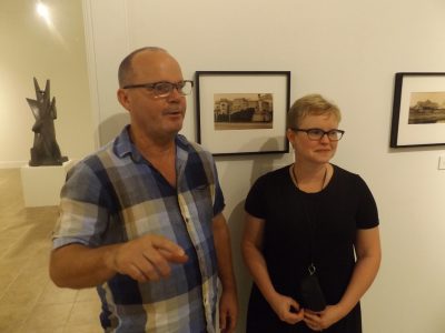 Andrew Murray Howe stands next to Tonya Curran in Hand Art Center