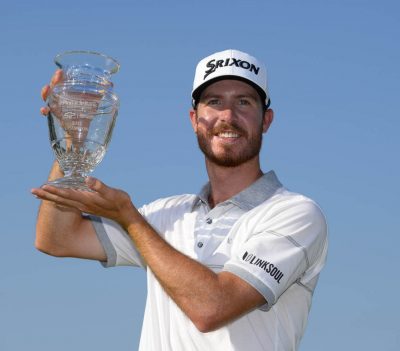 PGA Tour member Sam Ryder holds trophy