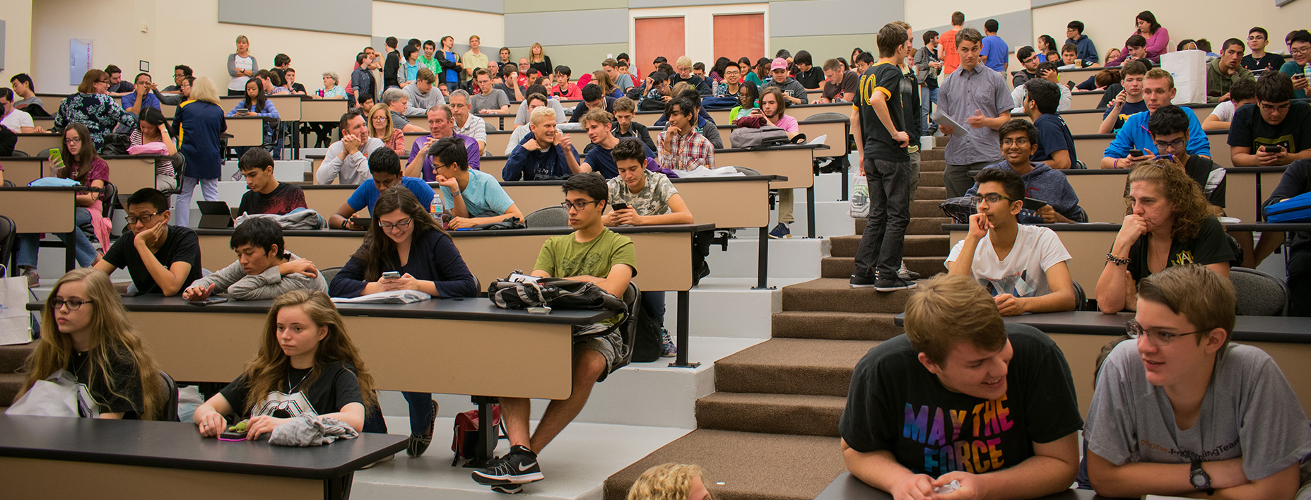 Auditorium is filled with high schools students