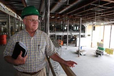 Al Allen stands in a construction zone inside the CUB overlooking the space that will be the new dining room