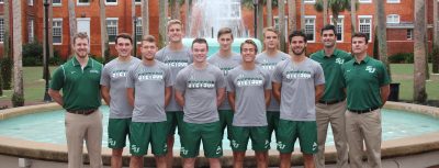 group photo with all the players and coaches in front of the Hollis Fountain in Palm Court on the Stetson DeLand campus.