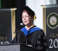 Megan O'Neill at the podium during Convocation