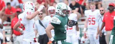 Hatter player sprints down the field with the ball