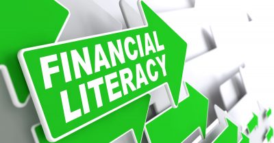 Financial Literacy Green Arrows with Slogan on a Grey Background Indicate the Direction.