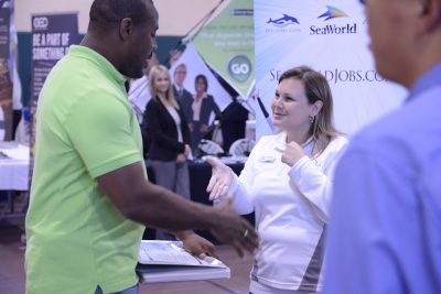 File shot of student talking to an employer at Stetson job fair
