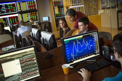 Students work in the Roland George Trading Room at Stetson University