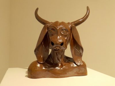 brown ceramic bust of an anthropomorphic Brahman bull