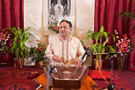 Indian musician and adjunct professor "Nandu" Muley sits at a santoor