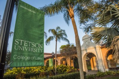 A bannder says Stetson College of Law in front of the Gulfport campus