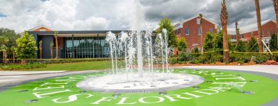 Jets of water come out of the concrete pad in front of the Carlton Union Building