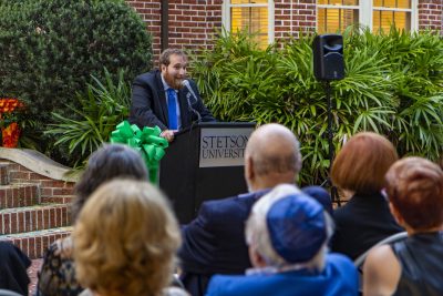 Joseph Ginsburg speaks to the assembled crowd