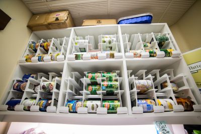 Containers of canned vegetables on the wall