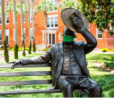 John B. Stetson statue wears a face covering