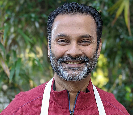 portrait of Hari Pulapaka, who is organizing dinner to help Ukrainians