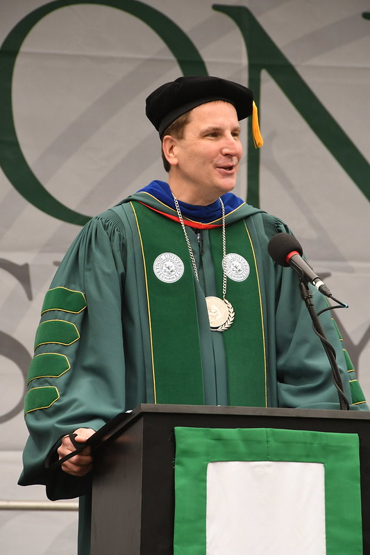 President Christopher Roellke speaks at a Commencement ceremony