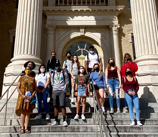 Rajni Shankar-Brown’s FSEM class gathers outside the Volusia County Historic Courthouse in DeLand