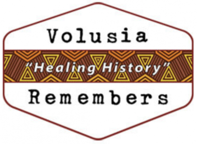 logo/graphic that says, Volusia Remembers, Healing History