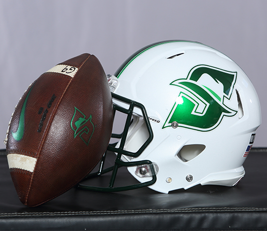Football and football helmet with the Stetson Athletics logo