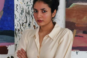 portrait with her artwork