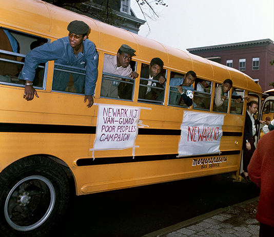 People on a bus headed to march in Washington, 1968.