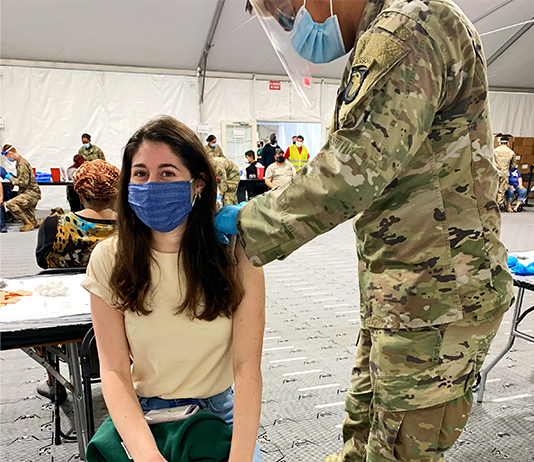 Student receives a vaccine at FEMA site in Orlando