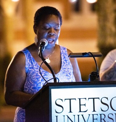 Joanne Harris-Duff speaks at the podium