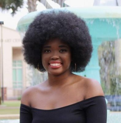 portrait in front of Holler Fountain